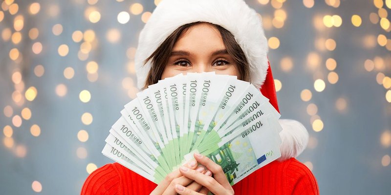 100-euro-xmas-girl-WIDE-shutterstock-1547090912.original