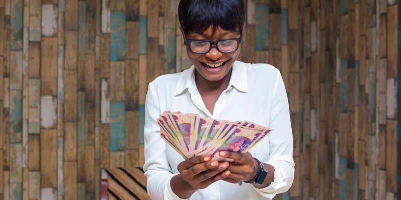 Africa-woman-happy-HEADER-shutterstock_14799355.original