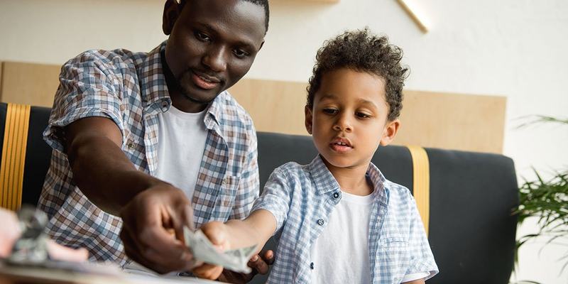 Dollars-black-dad-son-WDE-shutterstock_70659635.original