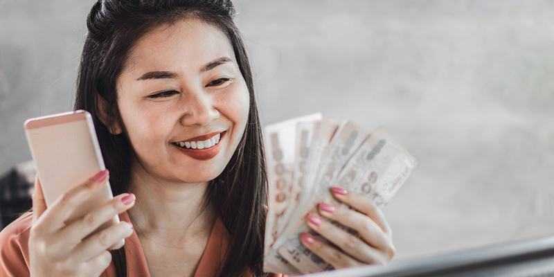 G4S-Asia-woman-cash-mobile-HEADER-shutterstock_.original