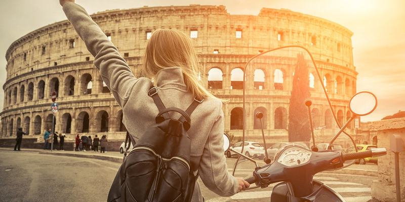 Italy-collusem-girl-vespa-HEADER-shutterstock-1.original (2)