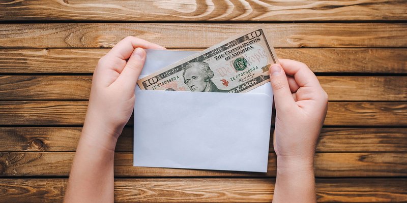 USA-dollars-envelope-HEADER-shutterstock_104944.original