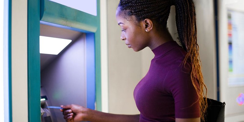 Woman-ATM-card-WIDE-shutterstock-1240951807.jpg