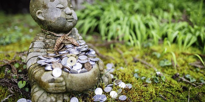 buddha coins closeup WIDE