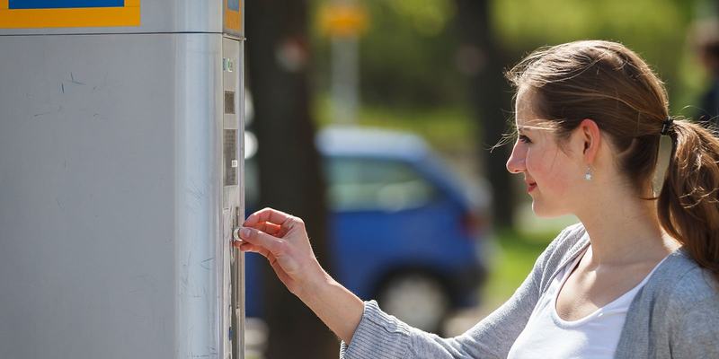 coin-parking-lady-HEADER-shutterstock_170024066.original