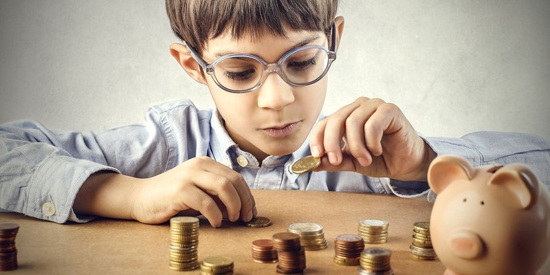 euro-coins-boy-glasses-HEADER-shutterstock-2448.original
