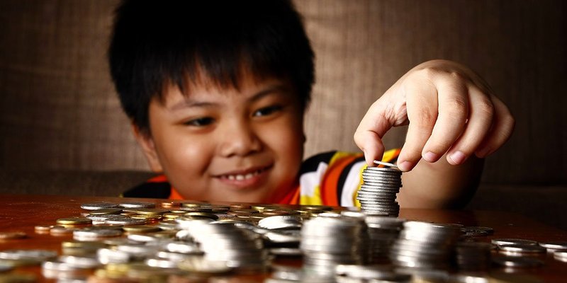 filipino-boy-coins-WIDE-shutterstock-268122911.jpg