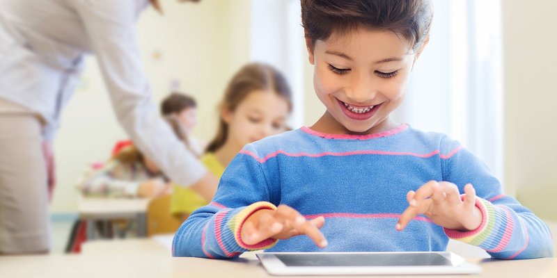 girl-class-ipad-HEADER-shutterstock_246299659.jpg