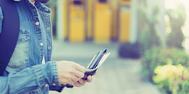 man-wallet-denim-WIDE-shutterstock-610291352.jpg