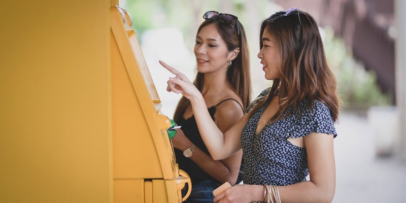 two-women-atm-HEADER-shutterstock_1512498137.original