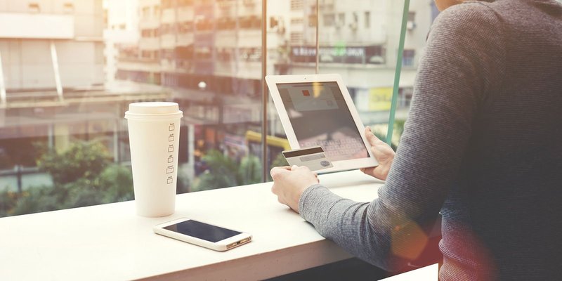 woman-card-laptop-HEADER-shutterstock-399952483.original