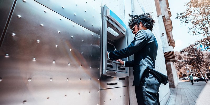 young-businessman-atm-1140x750.jpg